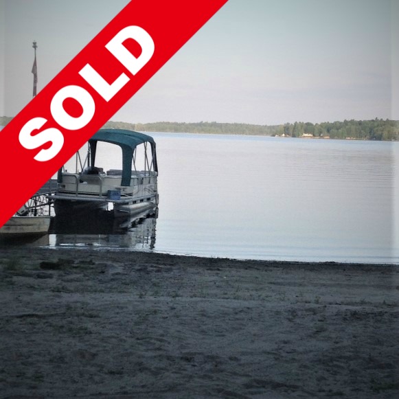 beach-with-boat-and-sand-1 sold_1