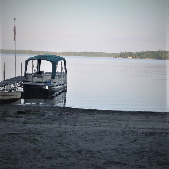 beach with boat and sand